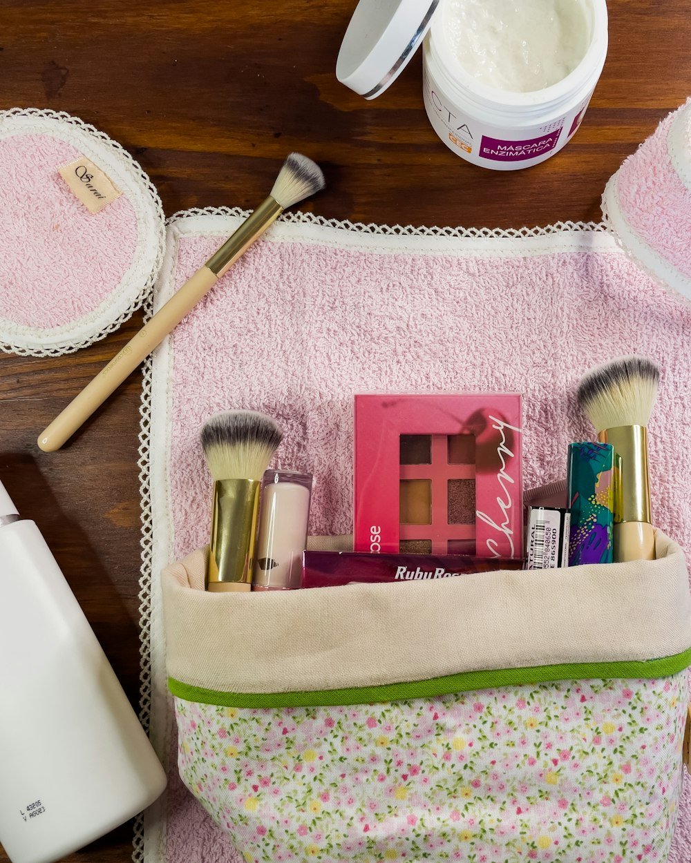 Small selection of everyday makeup products laid out